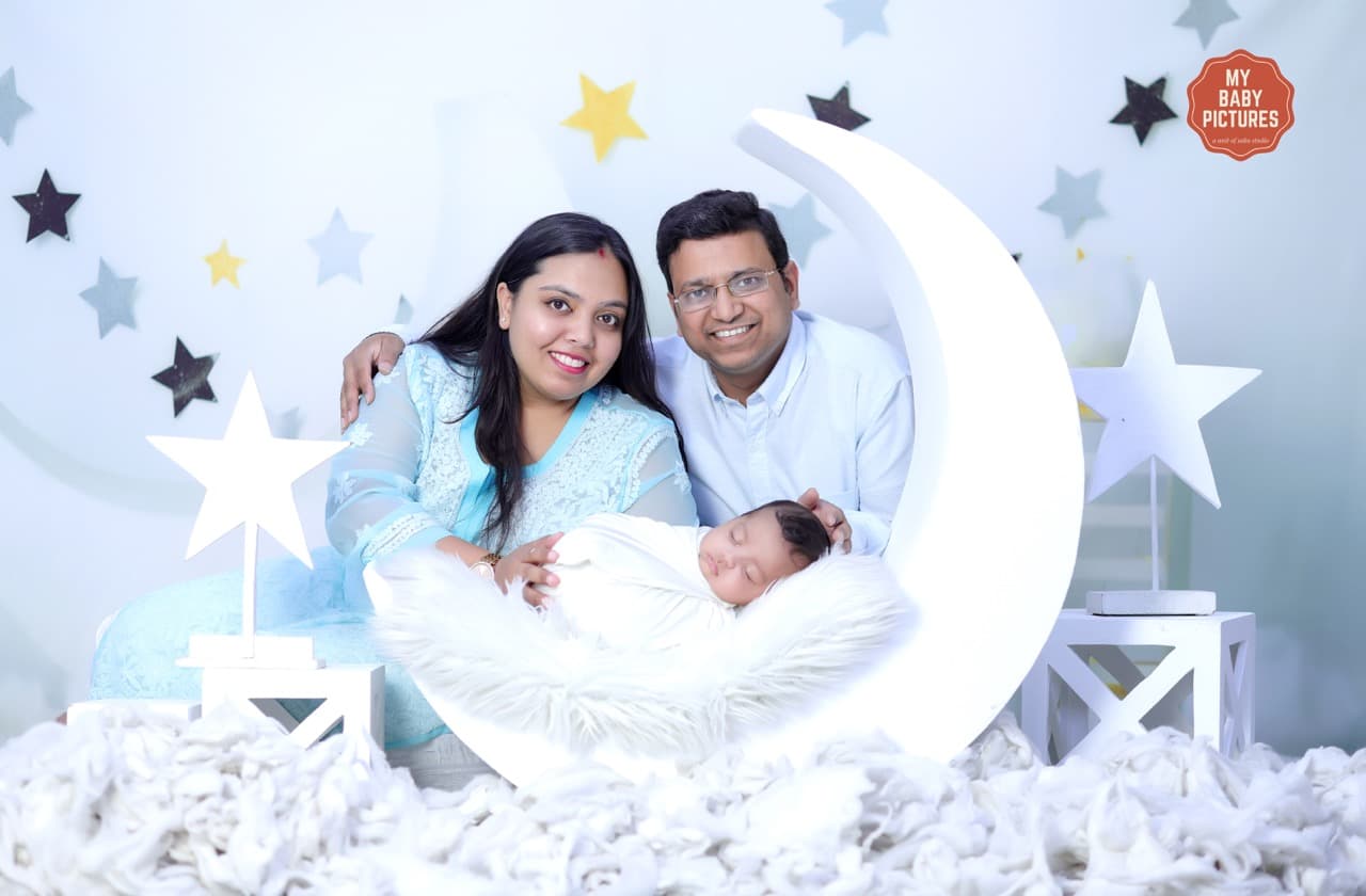 Candid family smile with newborn baby