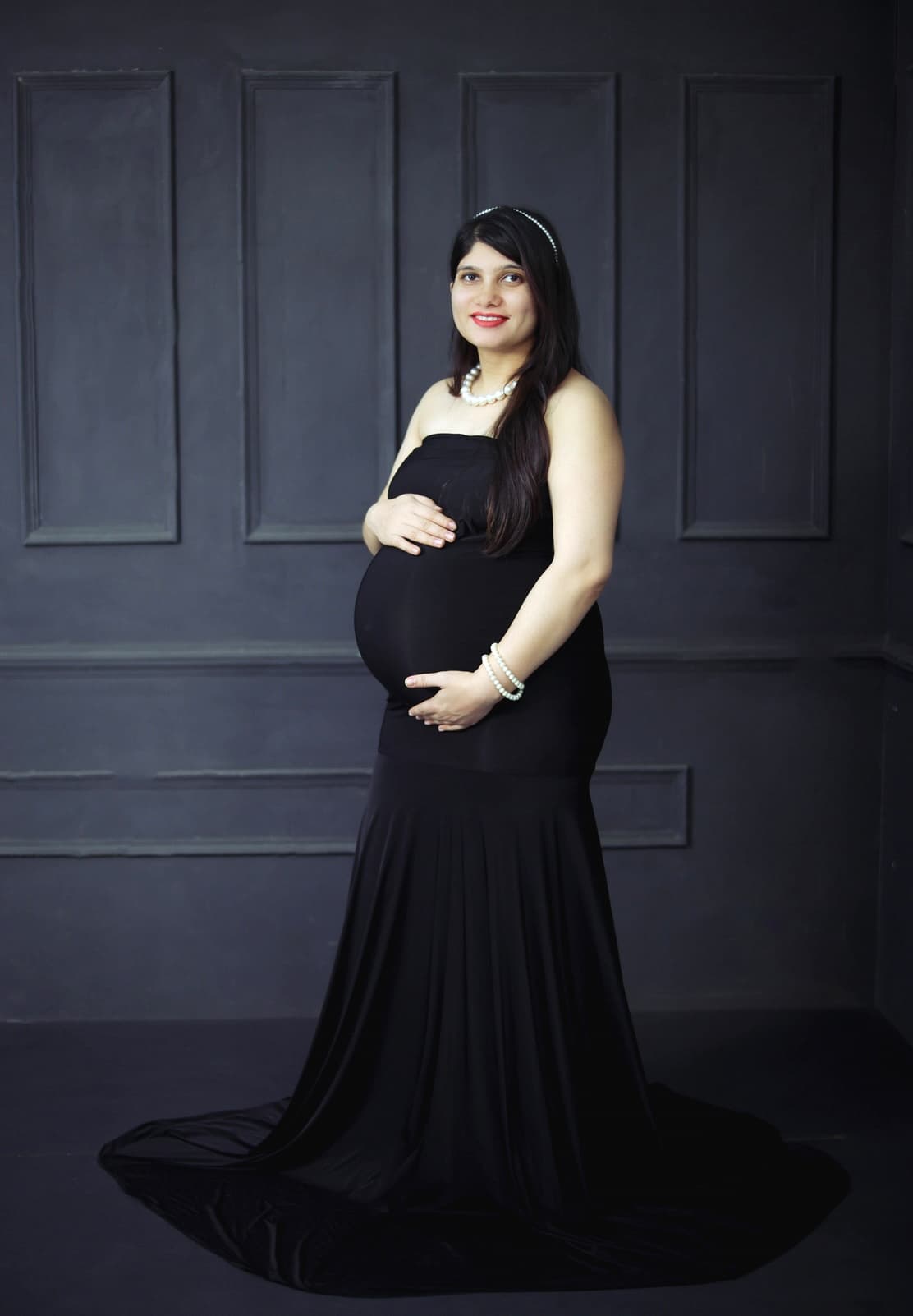 Black dress maternity silhouette portrait