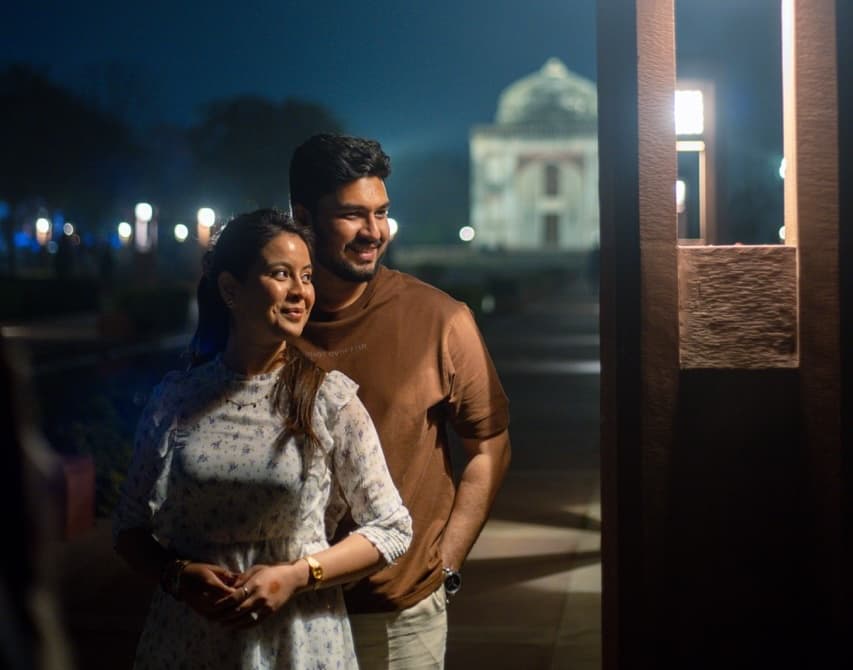 Couple portrait in garden setting at Sunder Nursery.