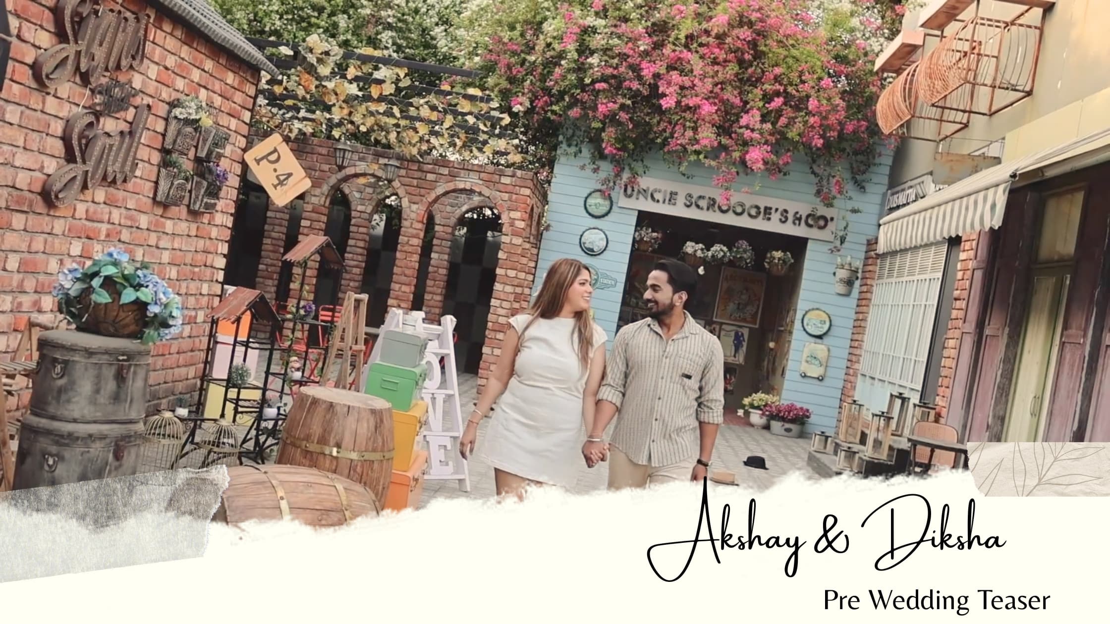 Couple posing during a luxury pre-wedding shoot in an elegant European-style studio.
